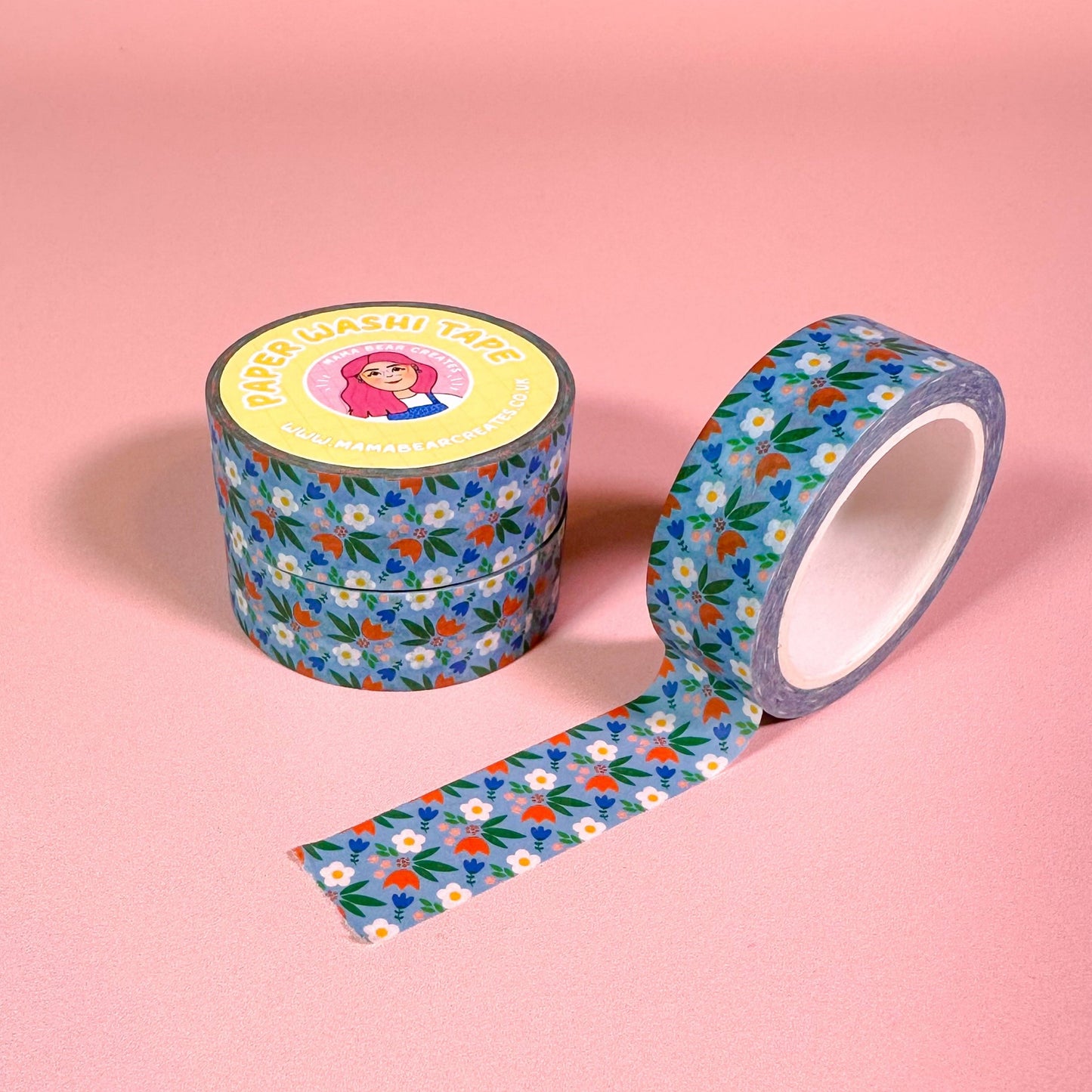 Floral-patterned tape on a pink background