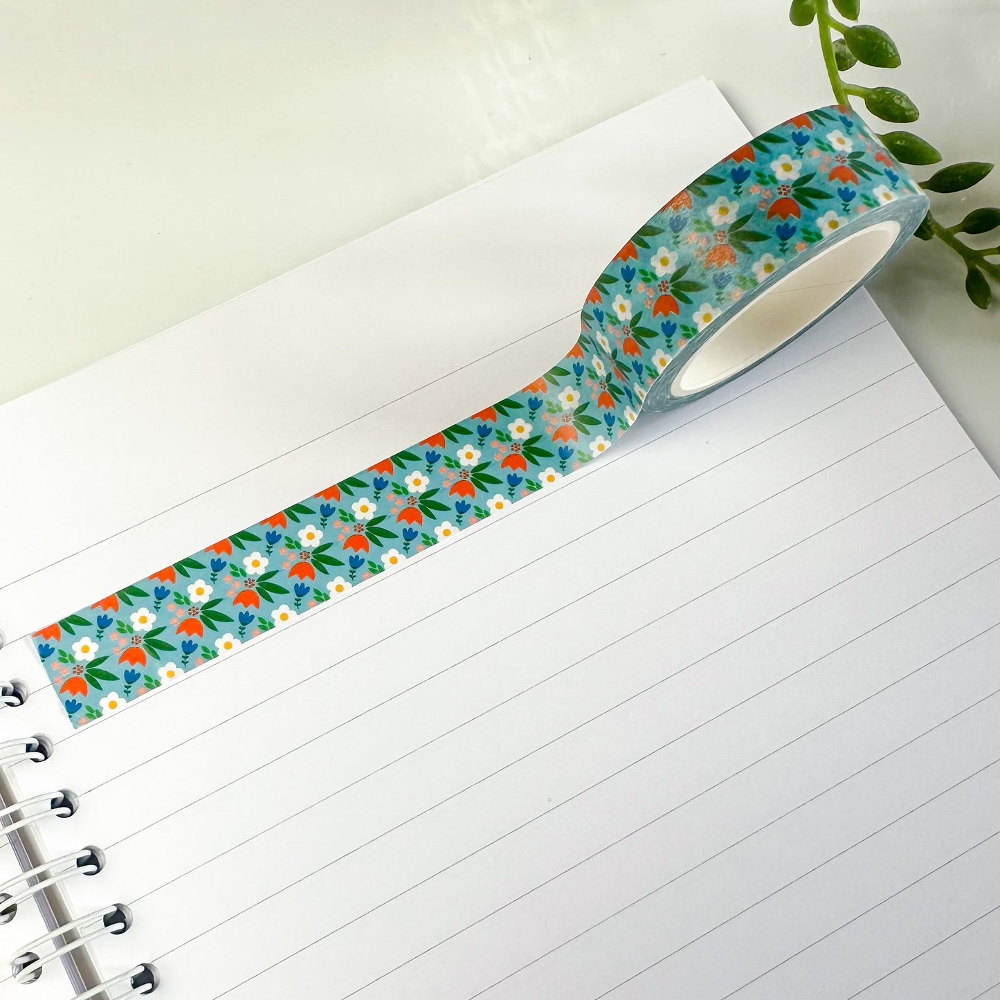 blue floral washi tape on notebook