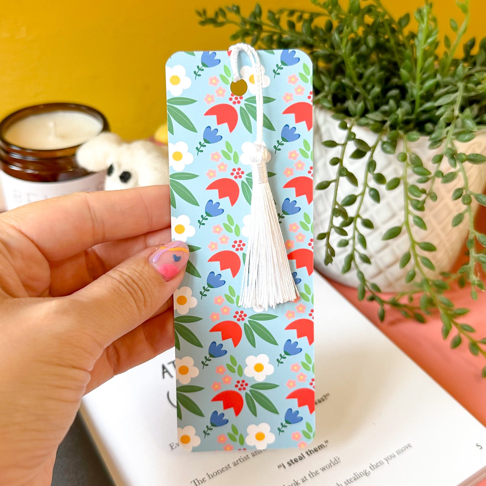 floral bookmark on pink background