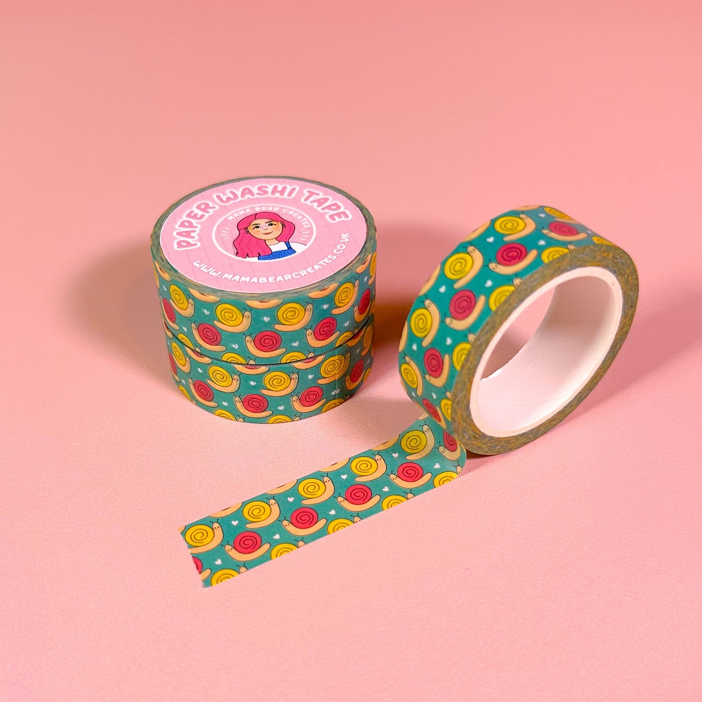 Decorative tape with colorful pattern on a pink background