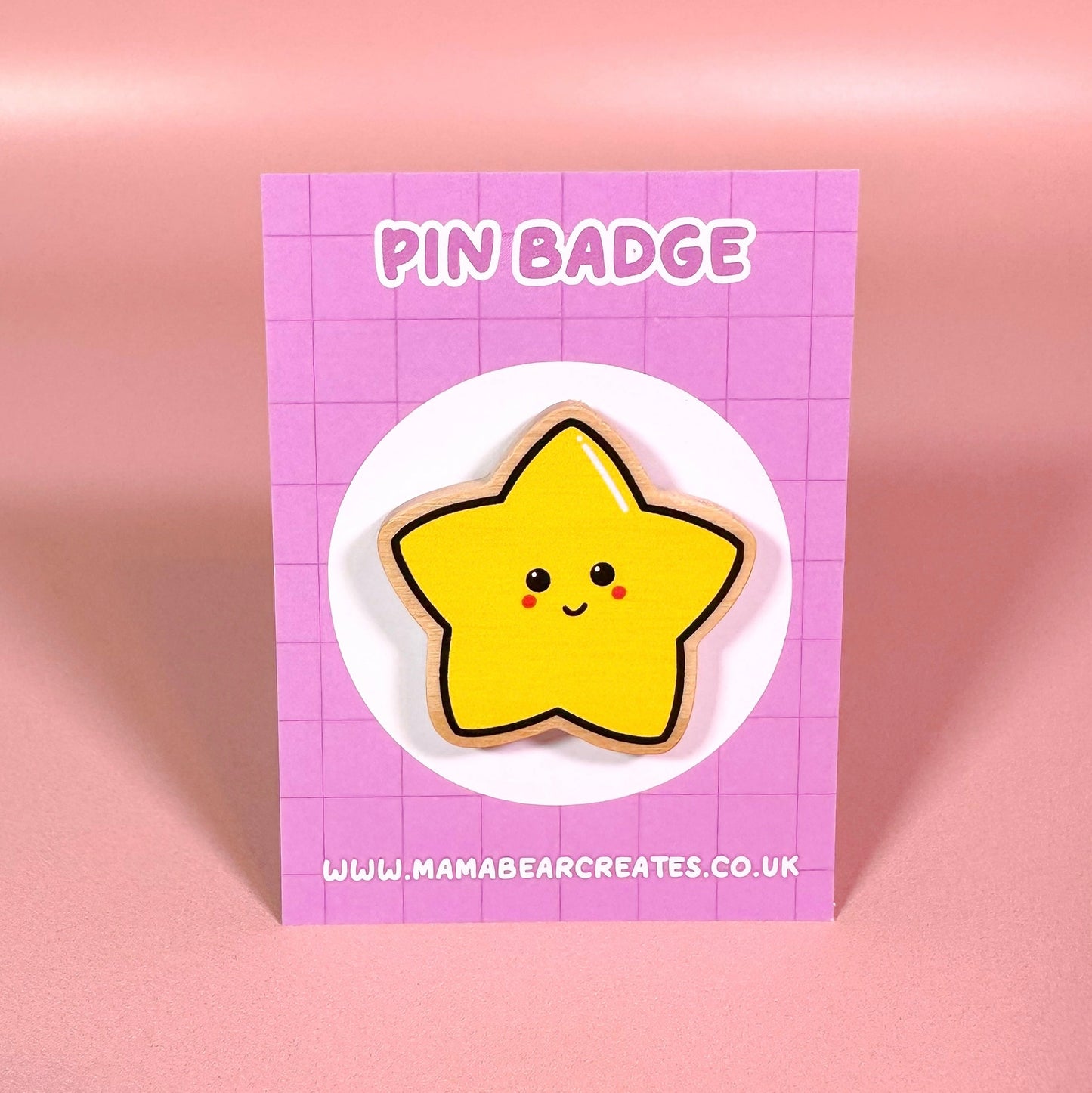 Star-shaped pin badge on a pink card with 'Mama Bear Creates' branding.
