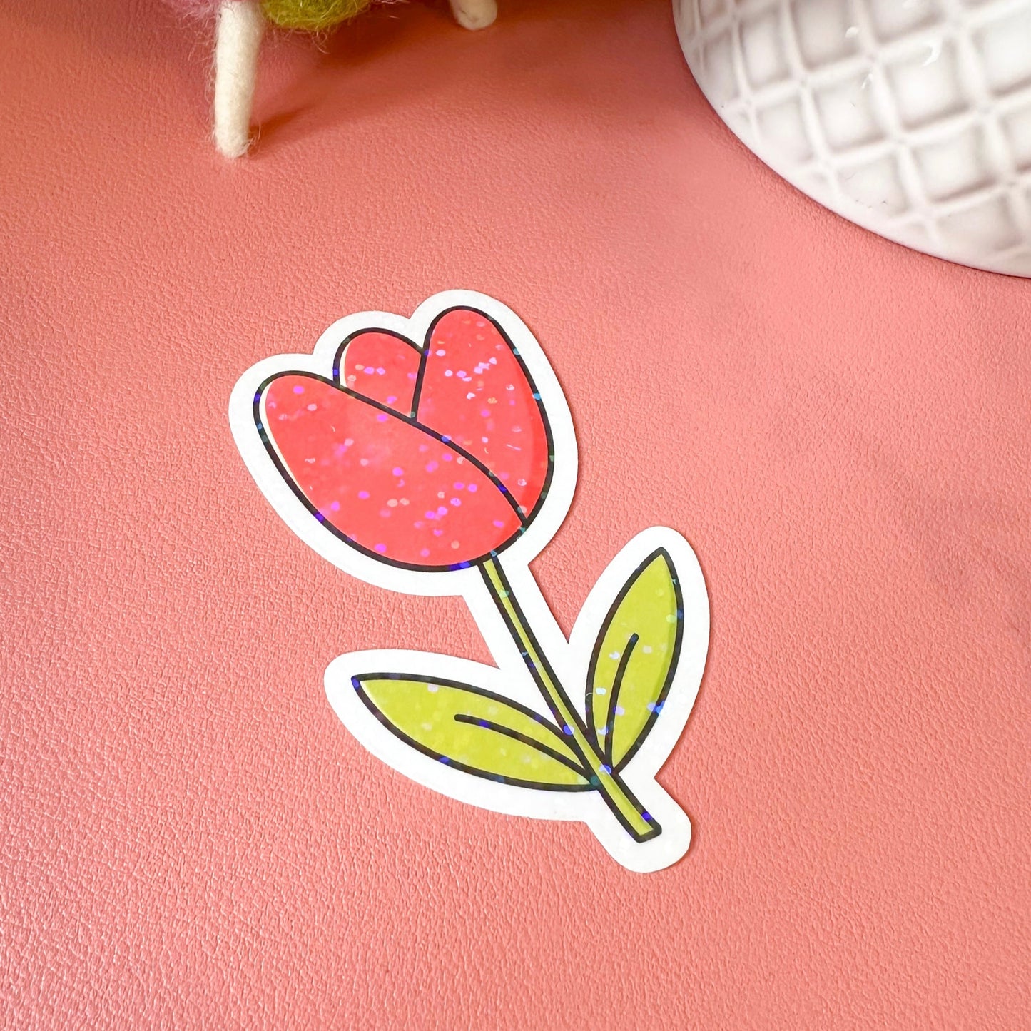 Sticker of a pink tulip on a pink background