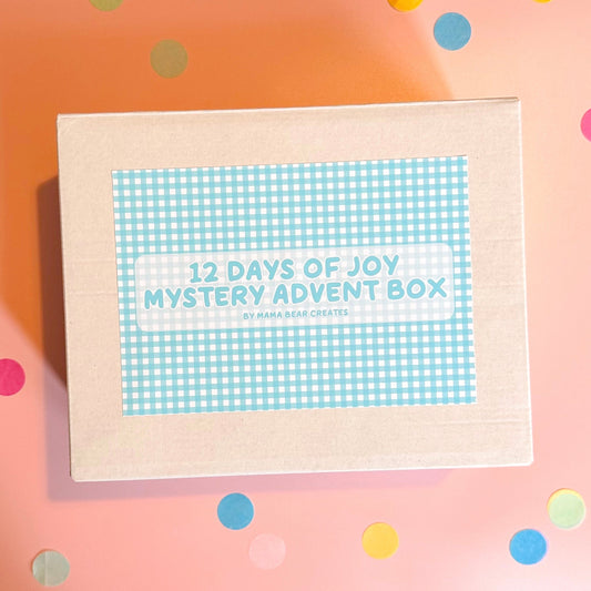 Card with '12 Days of Joy Mystery Advent Box' text on a colorful polka dot background