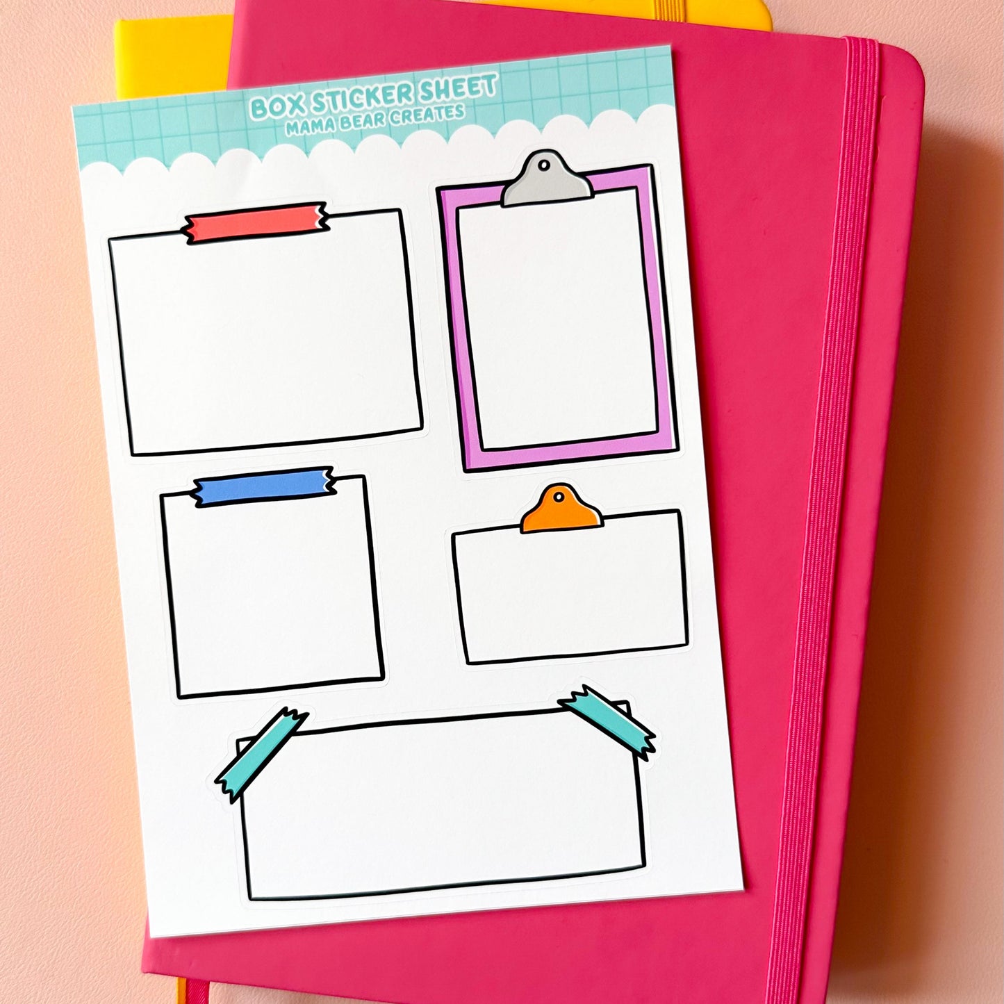 Sheet of colorful clipart frames on a pink notebook with a peach background