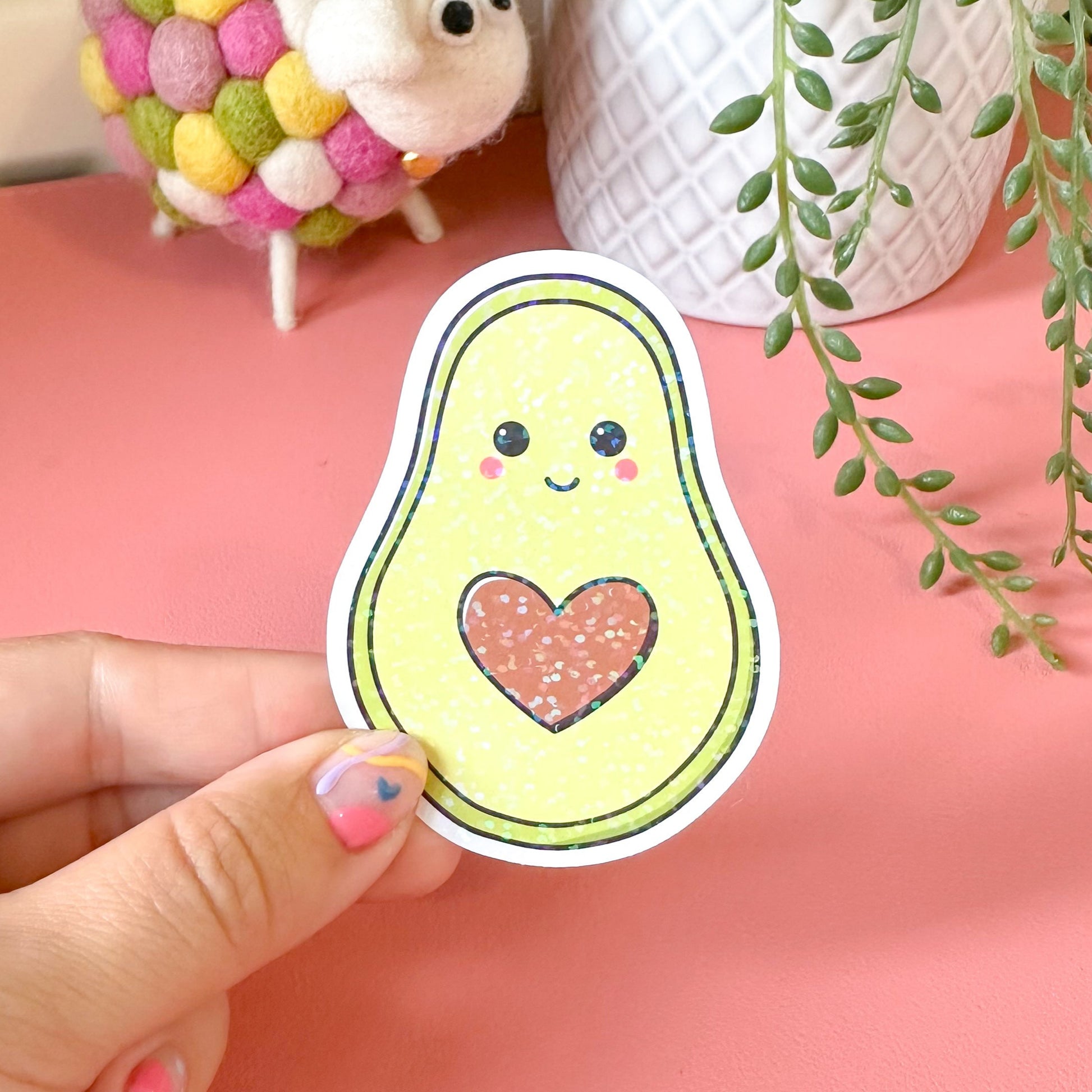 avocado sticker on pink background