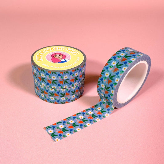 Floral-patterned tape on a pink background