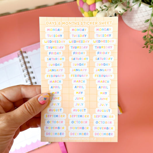 Sheet of days and months stickers held by a hand with a colorful background