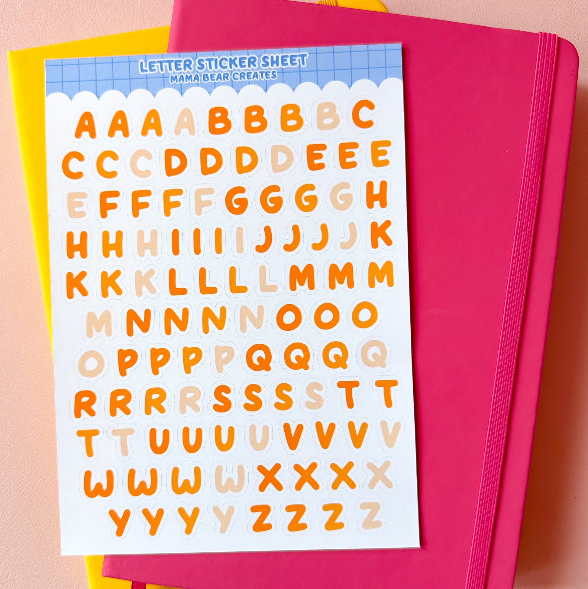 Letter sticker sheet with colorful letters on a pink background