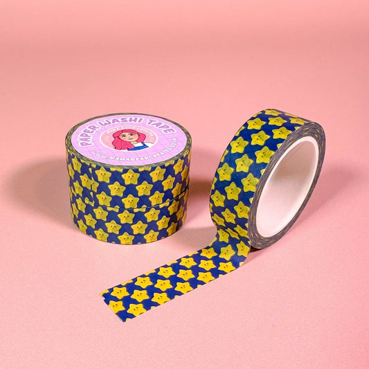 Washi tape with blue background and yellow stars on a pink background