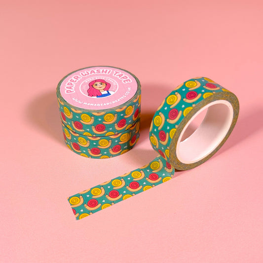 Decorative tape with colorful pattern on a pink background