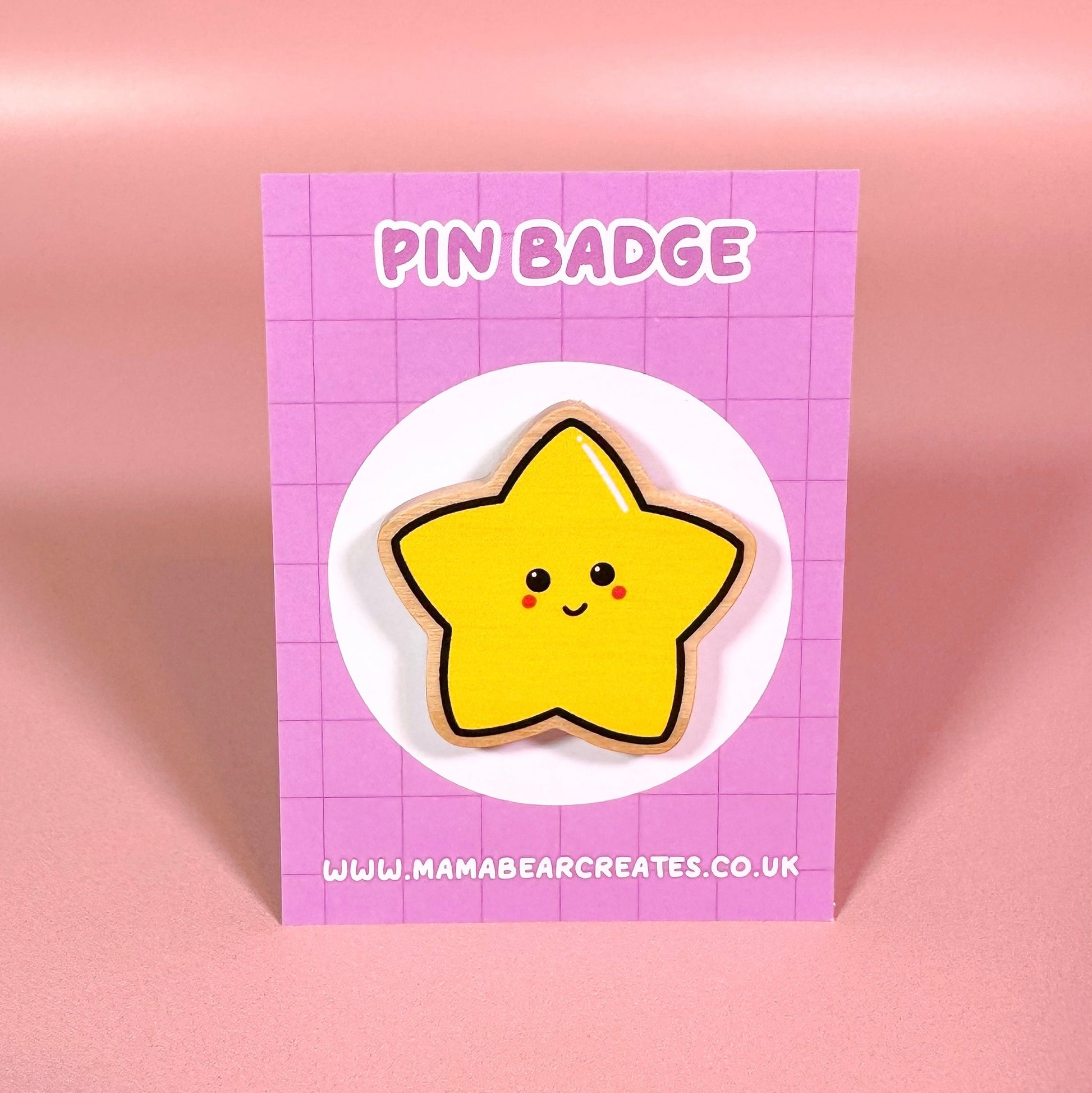 Star-shaped pin badge on a pink card with 'Mama Bear Creates' branding.