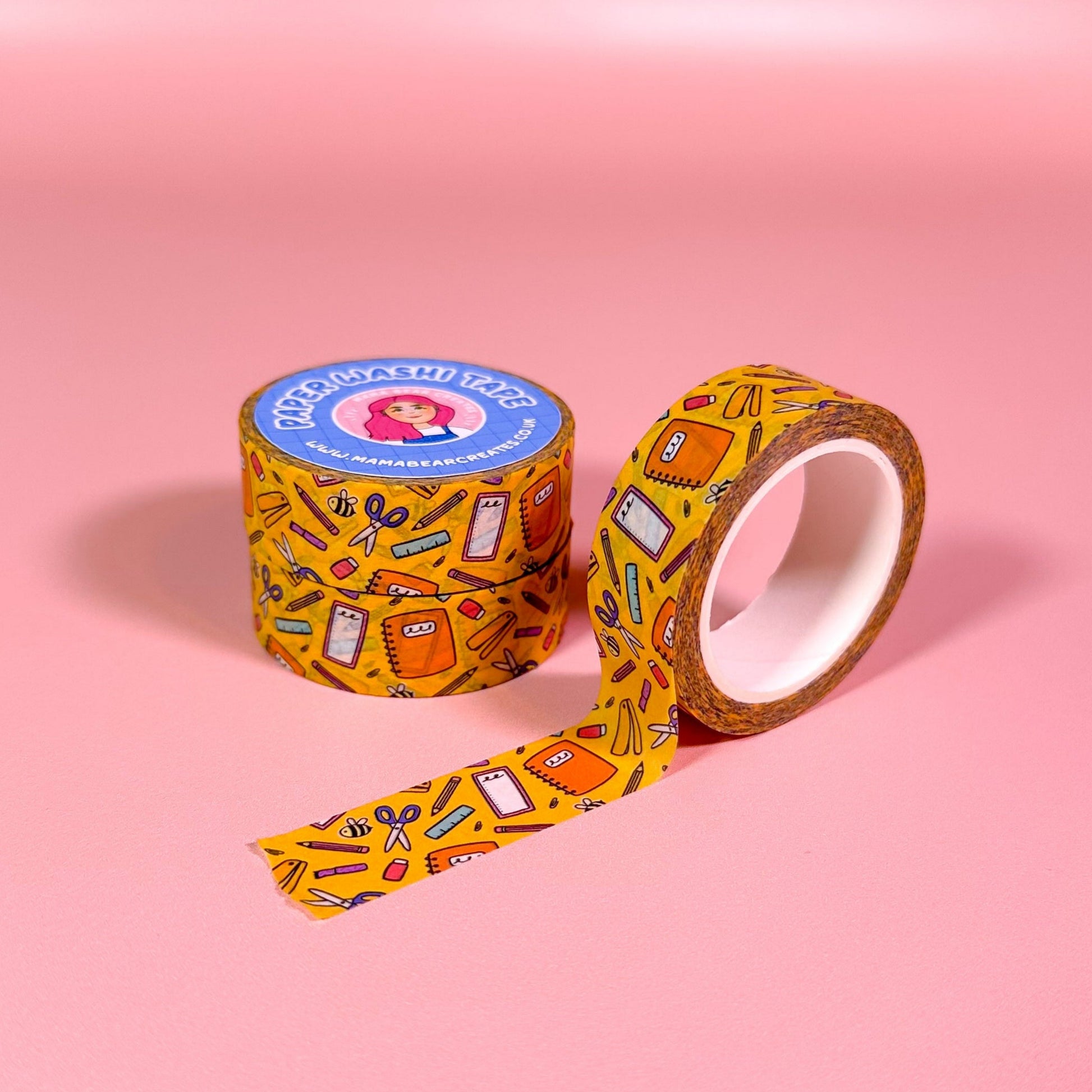 yellow stationery Washi tape with colorful design on a pink background